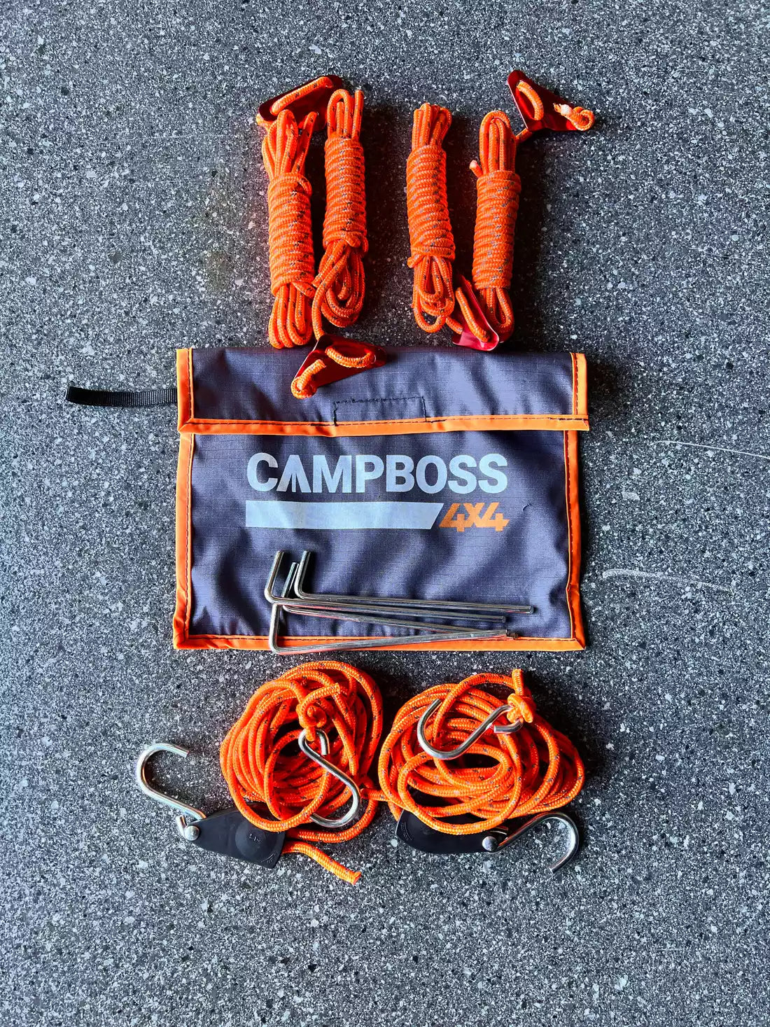 Cinghie arancioni per il tensionamento della tenda da sole campboss