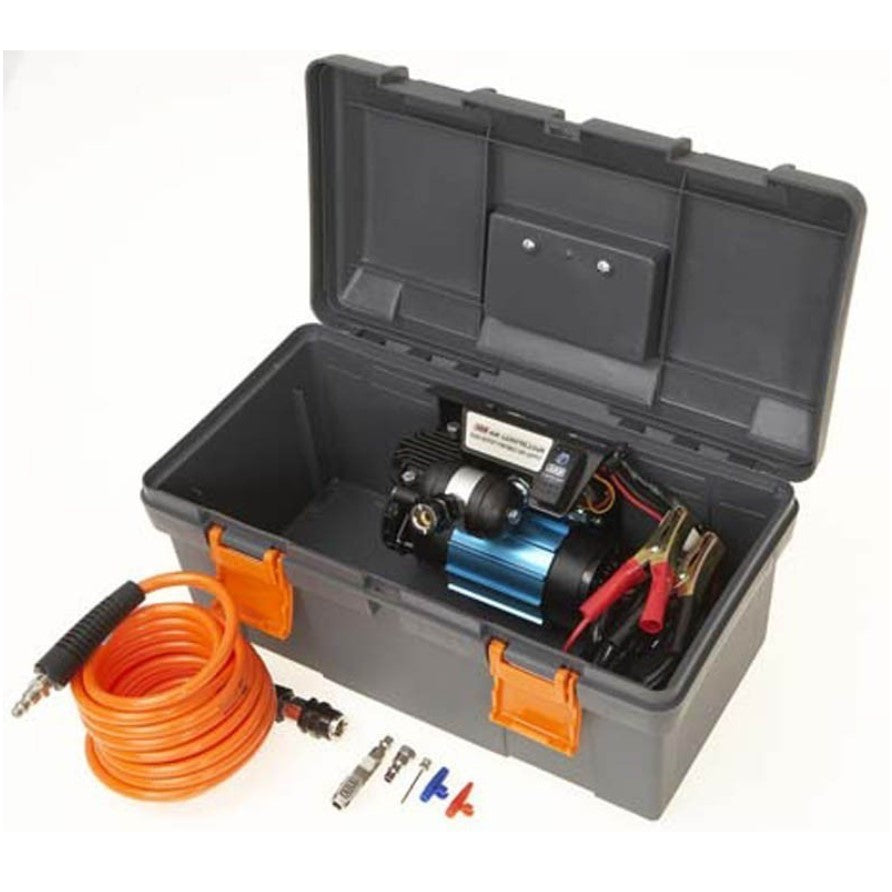 valigetta con compressore blu e tubo flessibile arancione